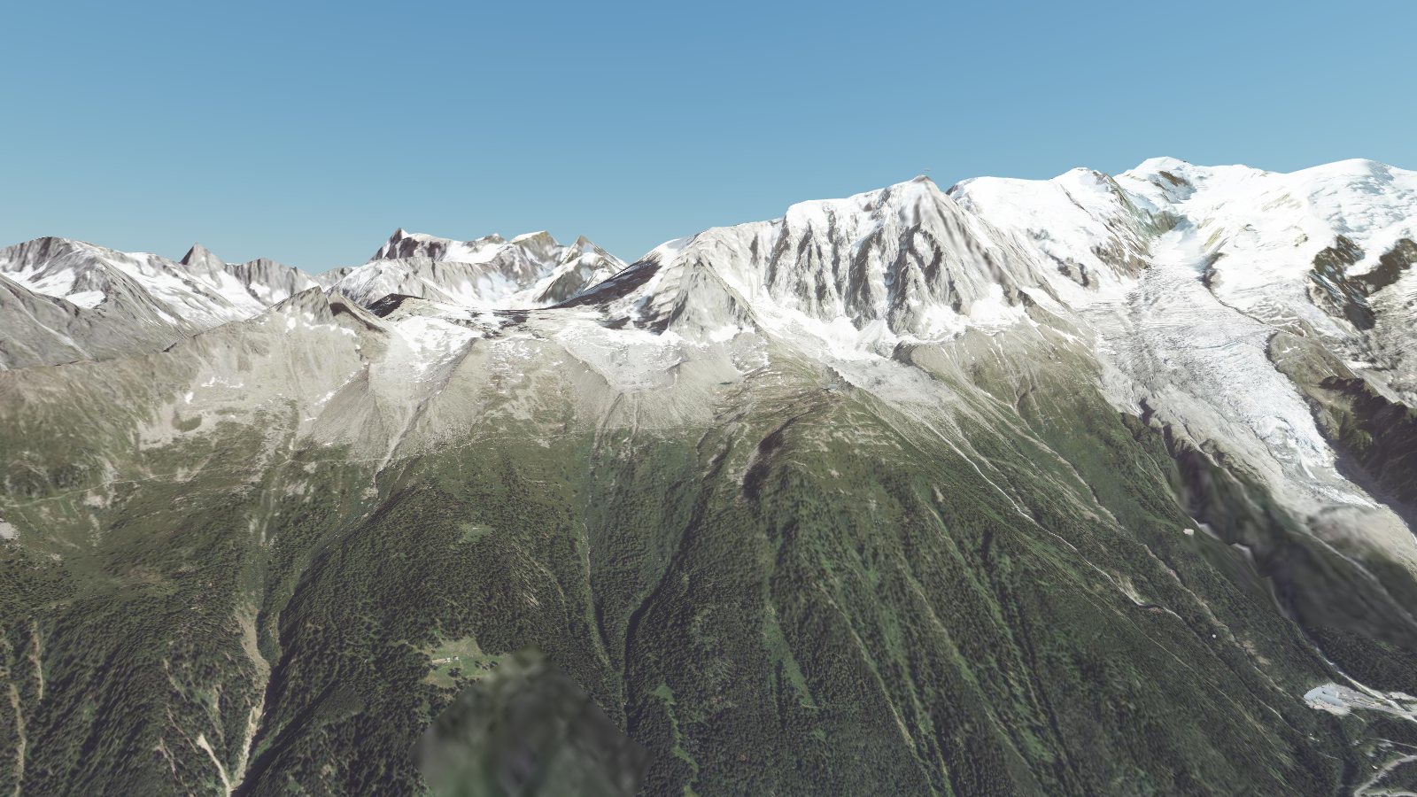 Le massif du Mont-Blanc vu depuis le cockpit, au-dessus de la vallée de Chamonix, dans Survol France